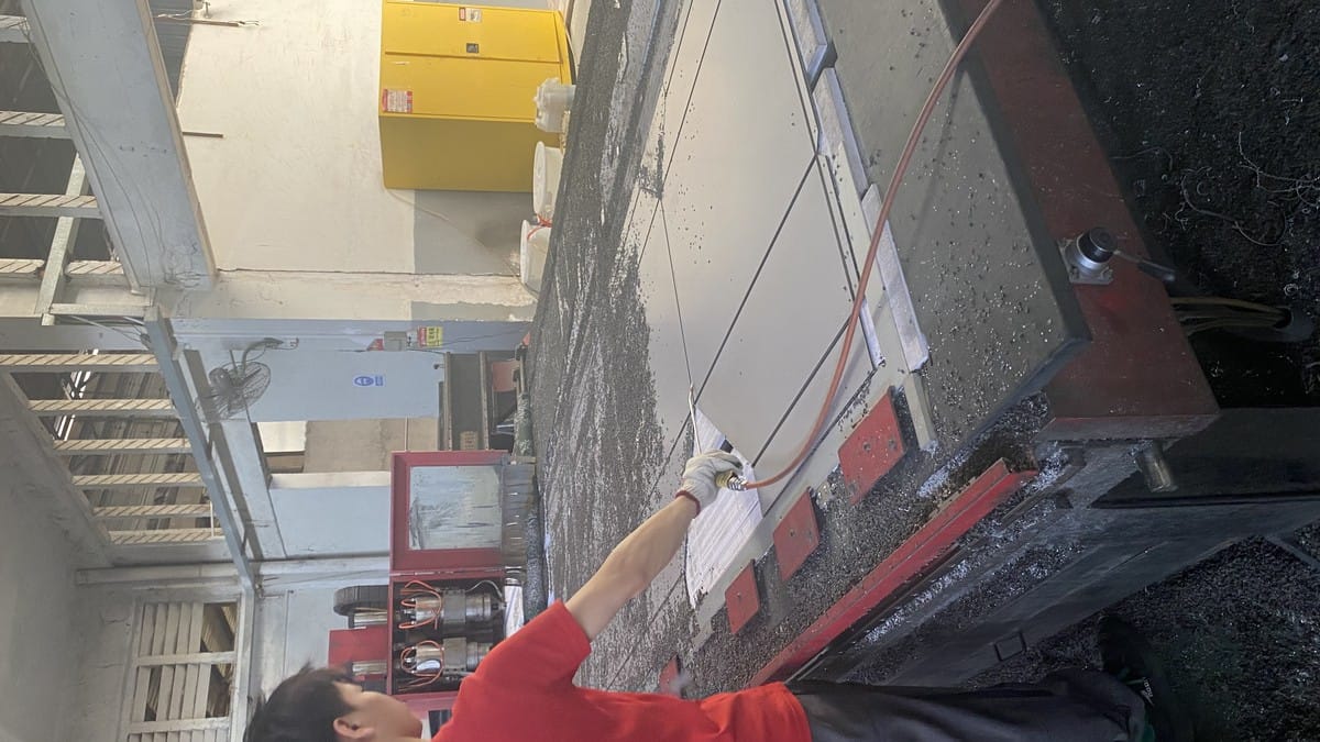 ACP panels being processed on a CNC routing table