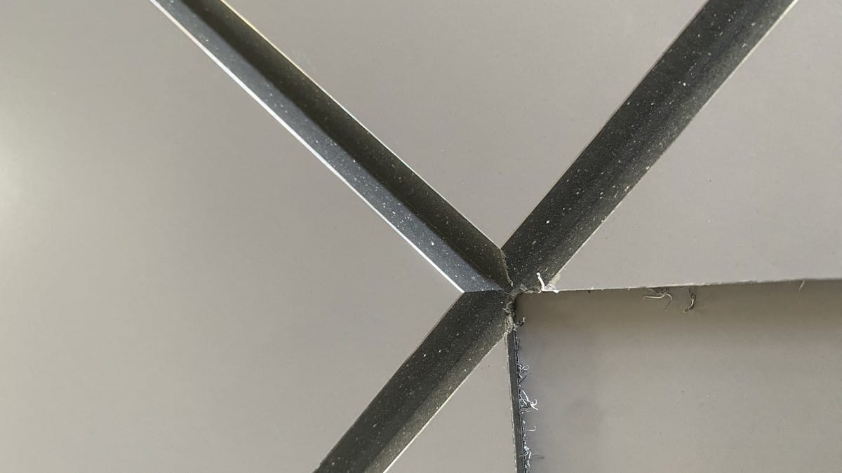 First-off ACP part with routed grooves ready for forming
