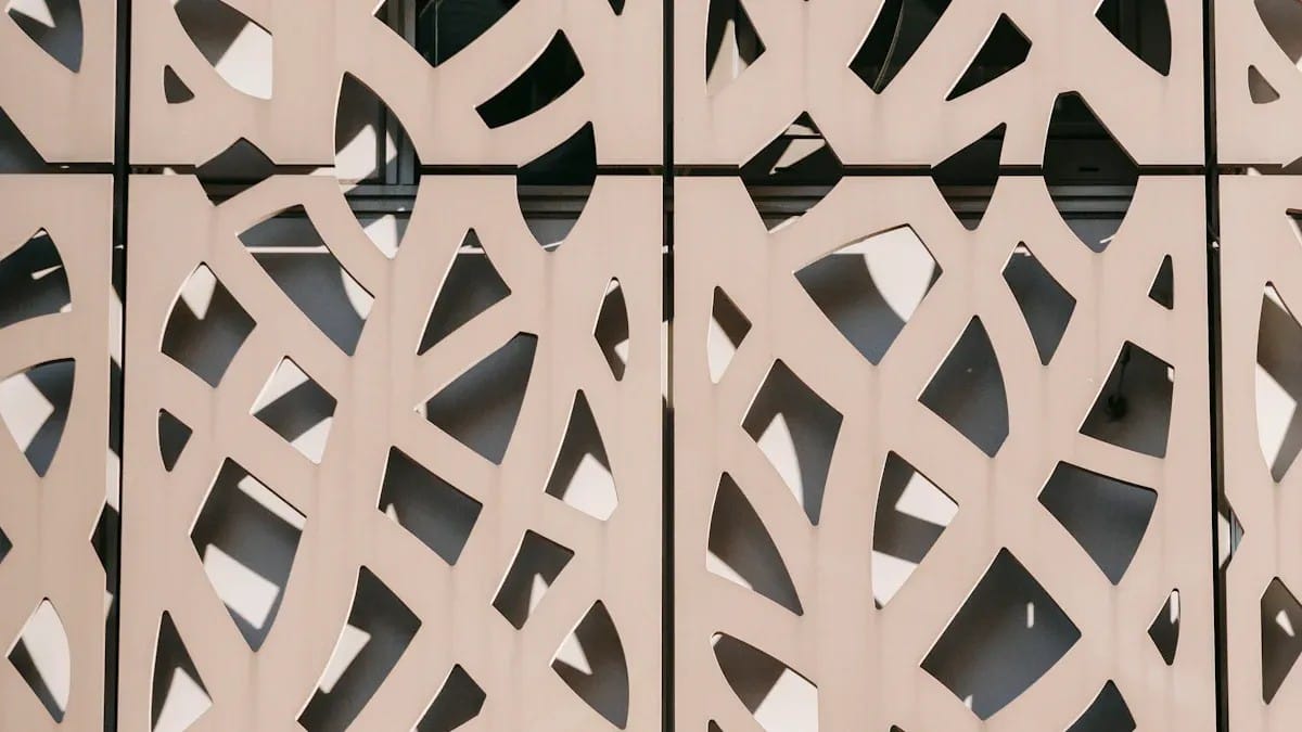 Decorative perforated metal screen used as a design reference for ACP patterns
