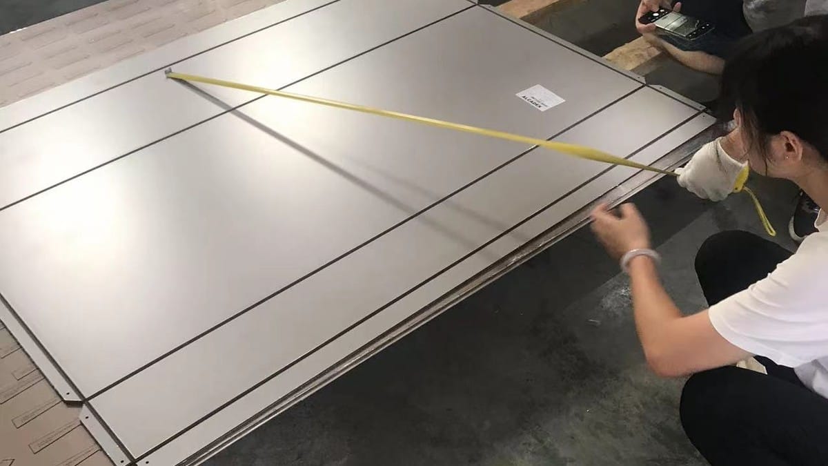 Alcadex fabricated ACP panels being checked against recorded dimensions